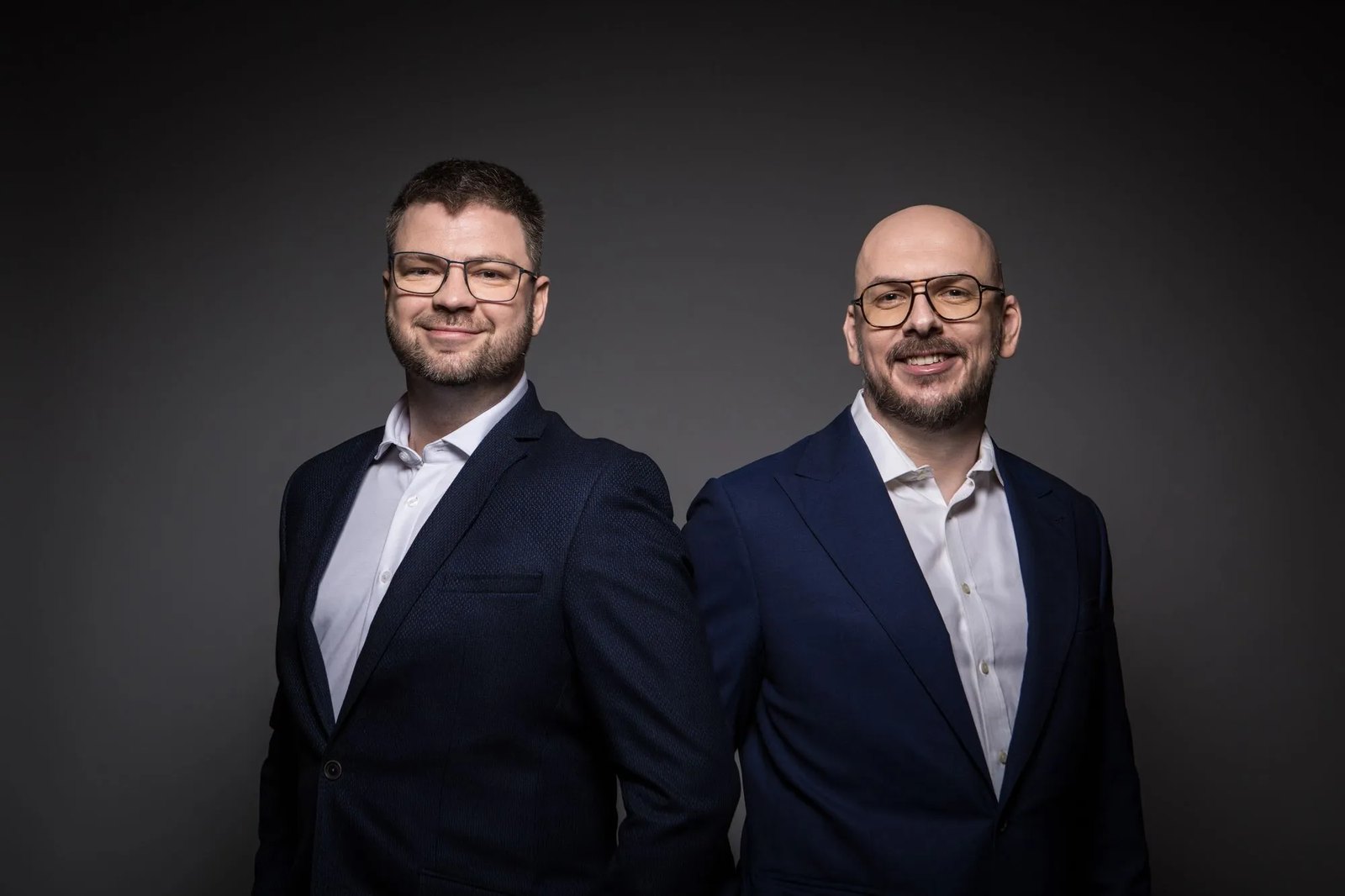 Lukasz Lazewski and Mariusz Pikula, founders of LLInformatics, standing side by side